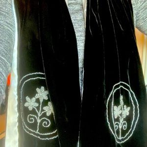 Black velvet scarf with silver satin lining and embroidered flower detailing.